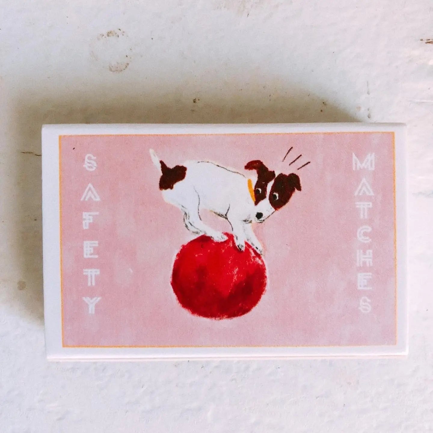 Dog on Ball on Pink Matchbox